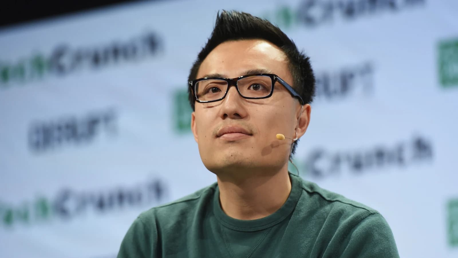 Сооснователь и глава DoorDash Тони Сюй выступает на конференции TechCrunch Disrupt NY.
